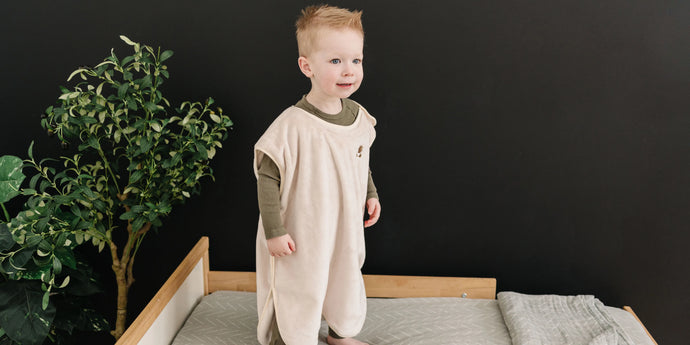 Young child wearing the Zinoa sleep suit